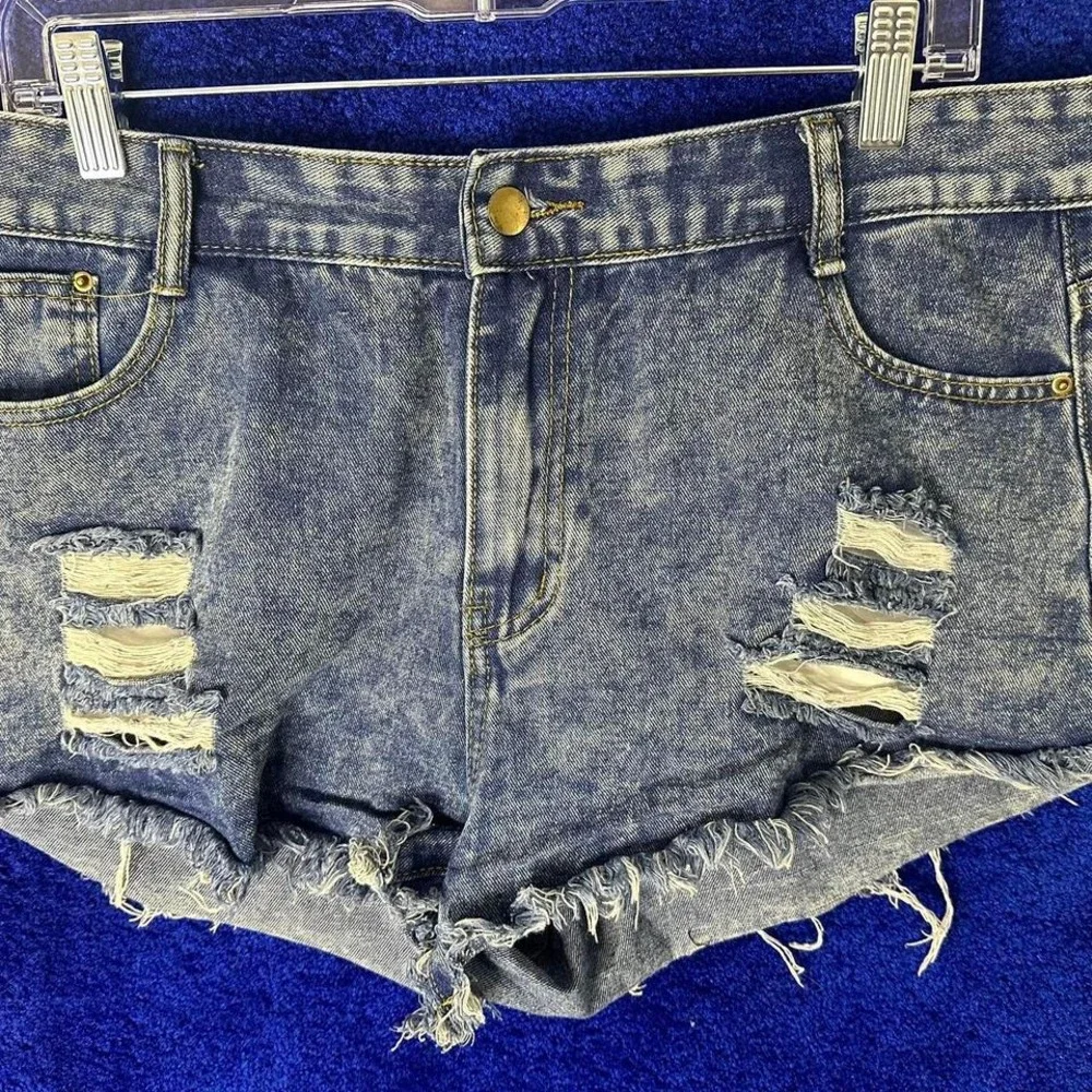 Distressed denim shorts with ripped details #denimshorts - Picture 1 of 4